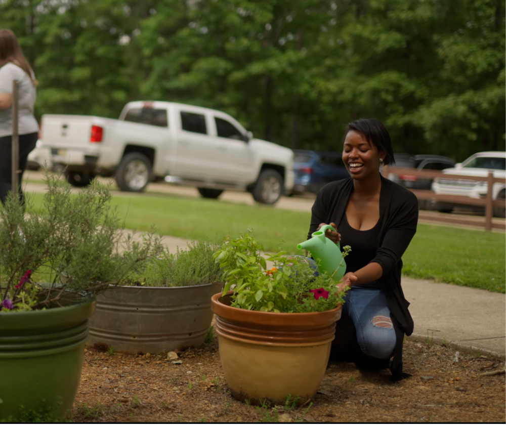 Clients tending garden